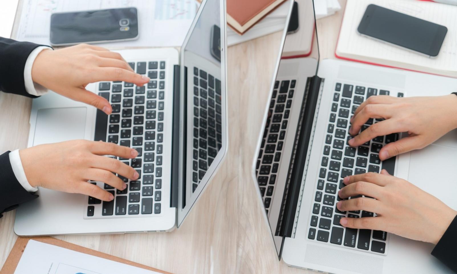 Students reviewing budget plans and financial documents